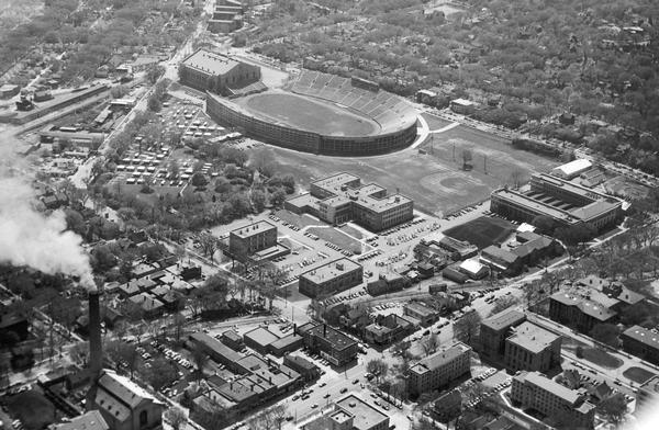 Aerial view of Camp Randall Stadium with the University of Wisconsin heating plant in foreground.