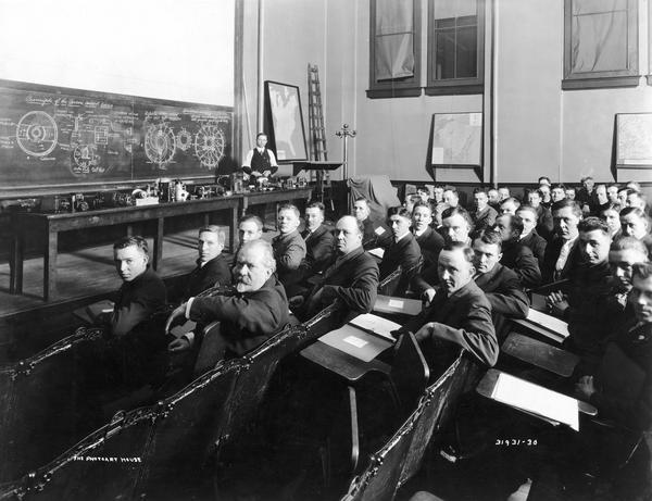 Men in a University of Wisconsin-Madison Extension Division class under Professor Consoliner. This appears to be an engineering class.