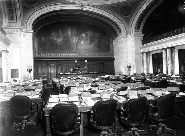 Wisconsin State Capitol Assembly Chamber, including the mural of Edwin Blashfield. The mural depicts Wisconsin's past, present and future and set the tone for subsequent artwork in the building.