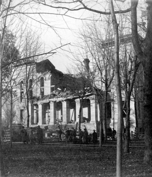 The third Wisconsin State Capitol after the unfinished South Wing collapsed on November 8, 1883. Defective workmanship and shoddy construction materials caused the nearly finished wing to collapse, killing six laborers and injuring twenty others. The accident created a scandal and provoked a public investigation. Frank Lloyd Wright was one of those who witnessed the collapse and he recalled it later in his autobiography, speaking of himself in the third person.