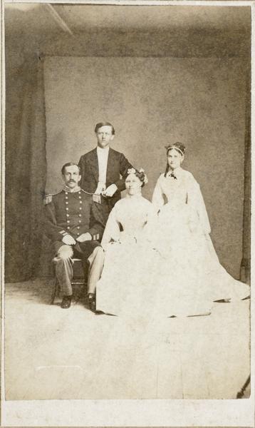 Wedding portrait of Lieutenant Loyd G. Harris, his bride and two attendants.