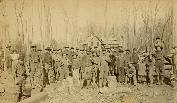 Outdoor group portrait of the Gogebic Range iron miners.