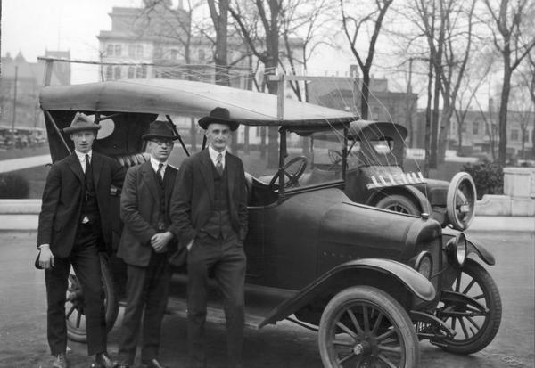 Madison's first radio car with its operators (l to r) Harry Tunstall, M.M. Littleton, and B.B. Jones, all from the State Department of Markets.