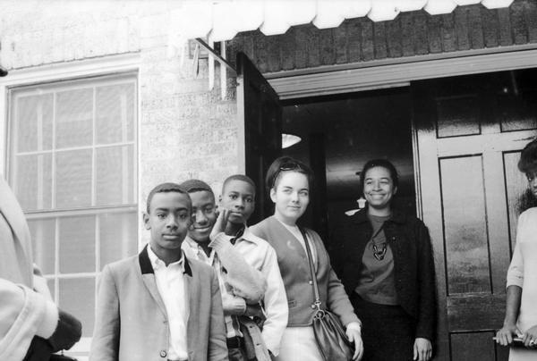 Three men and two women, including Margie Holman, at the statewide pre-conference committee meeting. SNCC Arkansas Project.