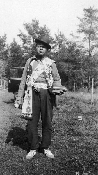 Charlie Duchmann, a Menominee, photographed in 1922. This image is part of an exhibit about Native Americans prepared by Paul Vanderbilt, the Wisconsin Historical Society's first curator of photography.