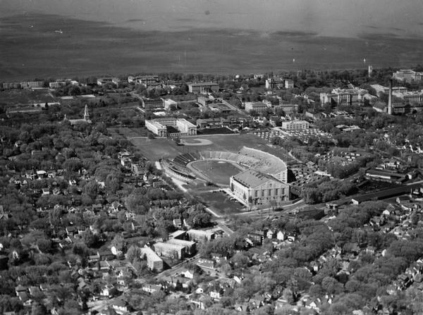 Aerial view of Camp Randall Stadium and Field House looking north on the University of Wisconsin-Madison campus with Lake Mendota in the background.