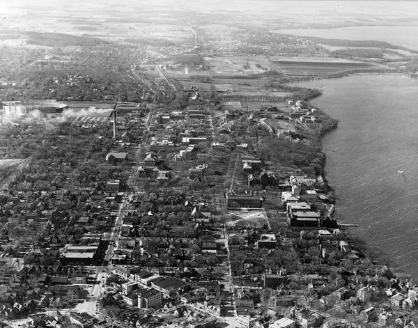 Aerial view of the University of Wisconsin campus with Lake Mendota on the right.