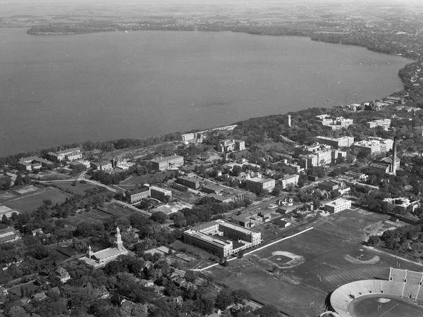 Aerial of University of Wisconsin-Madison campus with Camp Randall in the lower right corner and Lake Mendota, looking northeast to Maple Bluff.