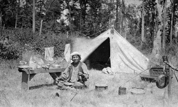 Joe Wisconsin, a Potowatomi Indian, grandson of Sheboygan war chief Pa-mob-a-mee.  Wisconsin was born at Sheboygan Falls about 1833 and is known to have been living in Forest County in 1918.  The photograph was made at the Bird & Wells camp near Wausaukee.  This image is part of an exhibit about Native Americans prepared by Paul Vanderbilt, the Wisconsin Historical Society's first curator of photography.