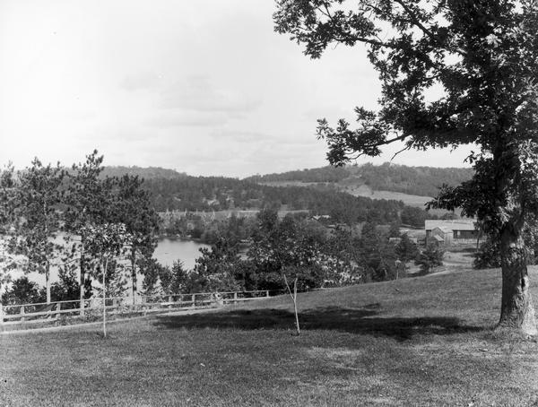 View from the Sherman House overlooking expansive lawn and river.