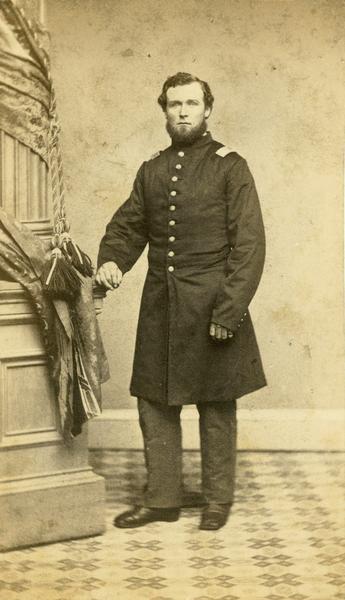 Studio portrait of E. A. Ramsay in uniform.