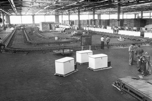 View of north section of International Harvester's Evansville Works warehouse testing of new conveyor line. The Evansville Works also produced refrigerators and air conditioners.