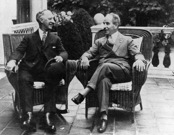 Al Smith and his National Chairman John Raskob on the porch of the Raskob home.