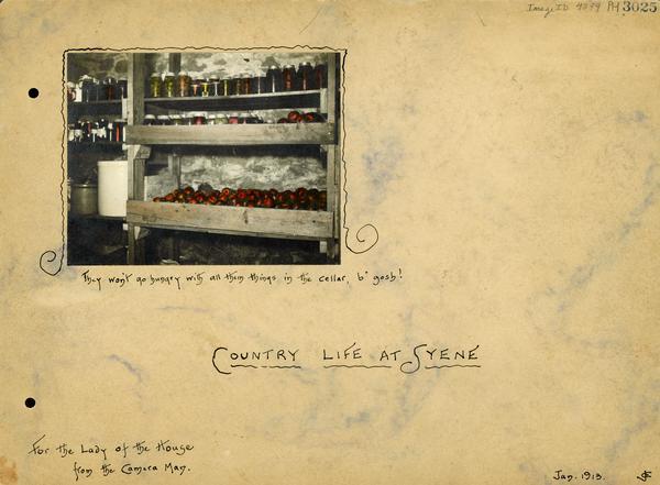 Cover of manuscript keepsake souvenir scrapbook titled "Country Life at Syene." The photograph of canned items and bins of fruit and vegetables in the cellar is captioned: "They won't be hungry with all them things in the cellar, b'gosh!" Caption at bottom left reads: "The Lady of the House from the Camera Man."