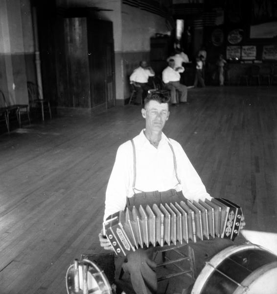 Joe Yanksy (Bohemian), a one-man band with accordion and drums.