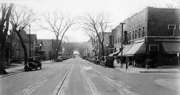 View down State Street, with the Carol Shop and H.H. Petrie Sporting Goods.
