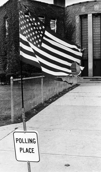 View of tattered flag at the Marquette Middle School Polling Place.