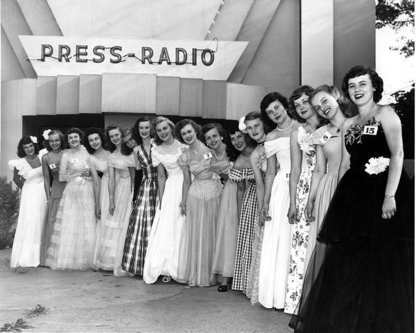 The 16 finalists in the 1949 Alice in Dairyland competition pose in front of the Press-Radio building at State Fair Park.  LaVonne Herman, fifth from the left, was chosen the 1949 Alice in Dairyland.