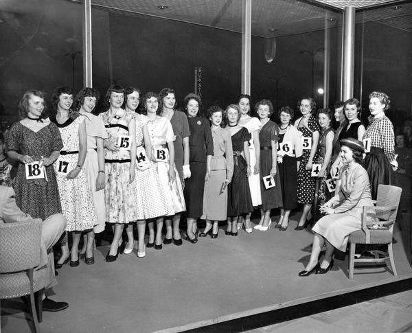 A group of women, identified as the "Southgate Finalists," was photographed during a contest for the opportunity to go on to compete for the 1952 Alice in Dairyland title.