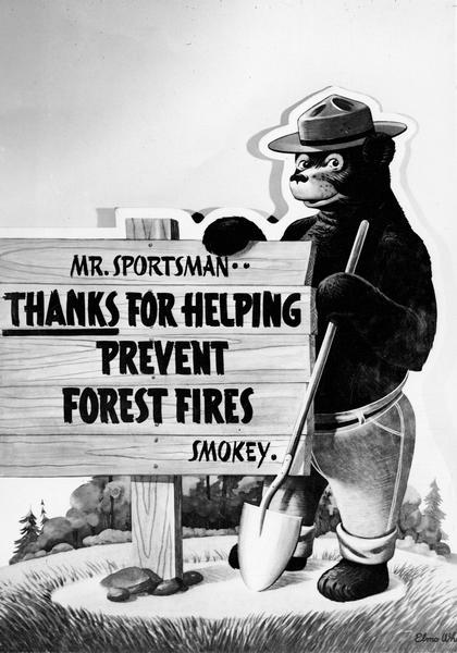 Cut-out of Smokey Bear standing next to a sign that reads: "Mr. Sportsman..Thanks for helping prevent forest fires. Smokey."
