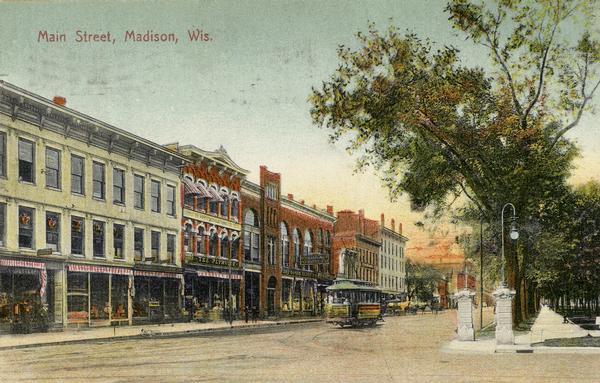 View of Main Street with streetcar. Caption reads: "Main Street, Madison, Wis."