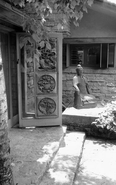 Southwest view of entry of Taliesin with Budda on right side. Taliesin is located in the vicinity of Spring Green, Wisconsin.