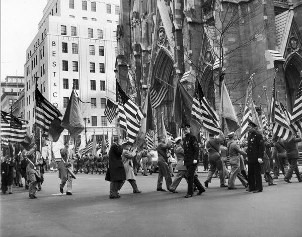 Catholic War Veterans of America parade in front of St. Patrick's Cathedral in recognition of Armistice Day.
