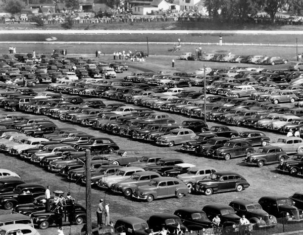 Elevated view of a parking lot filled with cars at the Wisconsin State Fair.