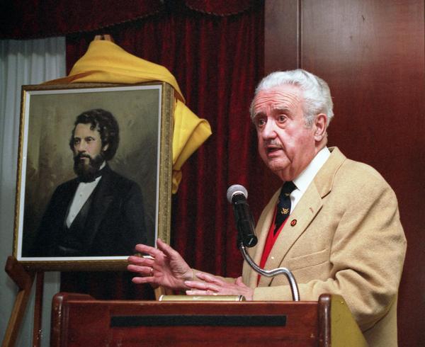 Former Governor Lee Sherman Dreyfus speaks at the unveiling of a portrait of Governor Arthur McArthur at The Madison Club. The painting is by portrait artist Jim Pollard.