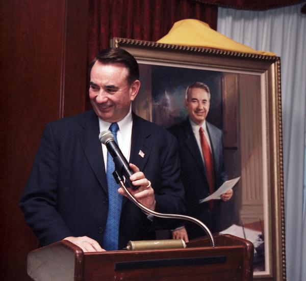 Former Governor Tommy G. Thompson speaks at the unveiling of his official portrait, painted by portrait artist George Pollard. The event took place at The Madison Club.
