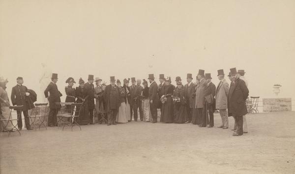 Benjamin Harrison, the 23rd President of the United States, with Mrs. Harrison and a group of men and women on the parapet of Sutro Heights, San Francisco, California.