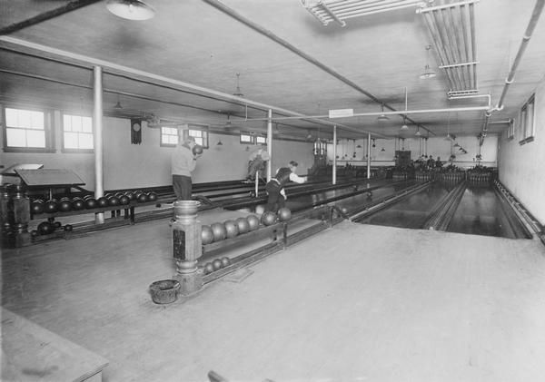 Four lane bowling alley built and operated by F.W. Kehl in the basement of his dance studio at 113-115 East Mifflin Street. F.W. Kehl and all his sons had winning bowling teams.