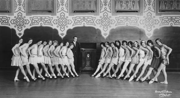 Leo T. Kehl with a line formation of students, most wearing tap or ballroom shoes. In addition to operation of the Kehl School of Dance in Madison, Kehl provided instruction in all forms of dance to teachers in Chicago and Milwaukee.