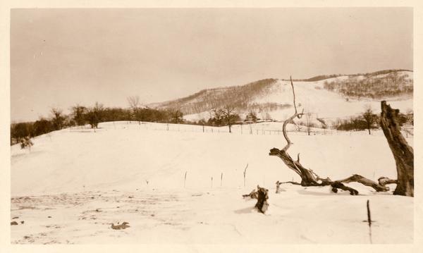 Winter landscape east of Taliesin.  Taliesin, the Wisconsin home of Frank Lloyd Wright, is in the distance. Taliesin is located in the vicinity of Spring Green.