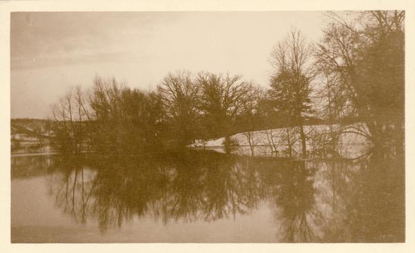 The pond at Taliesin, the home of Frank Lloyd Wright. Wright referred to the pond as a water garden. The pond was created when a stream on the property was dammed. Taliesin is located in the vicinity of Spring Green, Wisconsin.