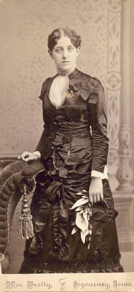 Studio portrait of Carrie Lane Chapman Catt when she was single in Mason City, Iowa. She was first a teacher and then became Superintendent of Schools there in 1883.