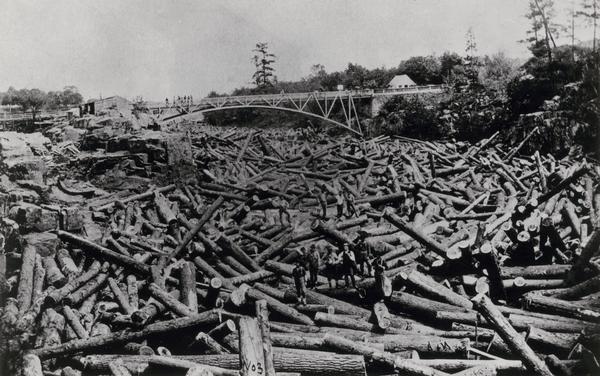 Log jam on the St. Croix River at the Head of the Dalles. The jam was about five miles long, and 50,000,000 board feet of white pine was piled up.