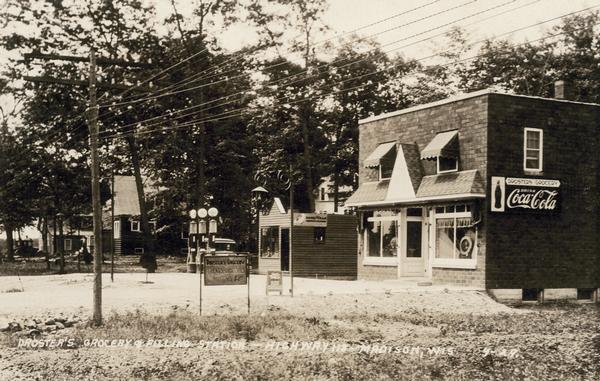 Exterior view of Droster's Grocery store and filling station. The business was located on the corner of 1438 North Sherman Avenue and Logan Street and was run by Roy Droster.