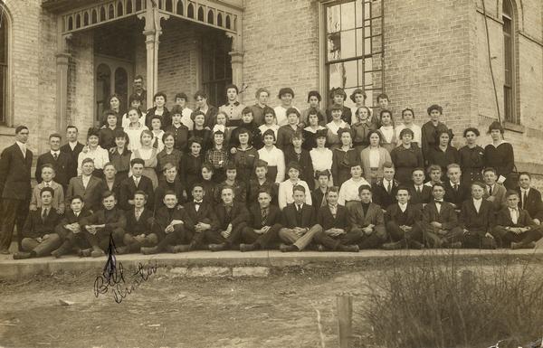 Group portrait of the 1914 Sun Prairie freshman class. Included in the group is Bill Droster, grandfather of the donor of this image.