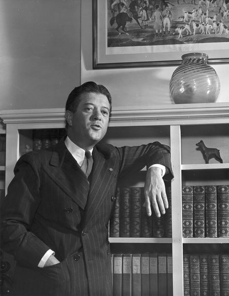 Informal portrait of Senator Robert M. La Follette, Jr., perhaps taken in the library at Maple Bluff Farm. Following his father's death in 1925 Bob Jr. was elected to the Senate.  He continued to serve as the leader of the Wisconsin Progressive Party until 1946.  At a party convention on March 17 in Portage he advised the declining Progressives to return to the Republican Party.  La Follette ran for reelection to the Senate in the Republican primary and lost to Joseph R. McCarthy.