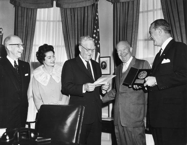 Presentation of the Heart Award by President Eisenhower and Senator Lyndon Johnson. The citation is read by Bruce Barton.
