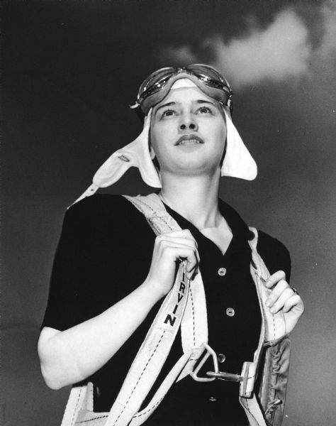 "She's Ready to Defend America," a portrait of Georgette Louise Meyer (aka Dickey Chapelle), as a member of the Women Flyers of America, an organization formed in 1940 to teach women to fly and then to ferry American bombers to Great Britain.