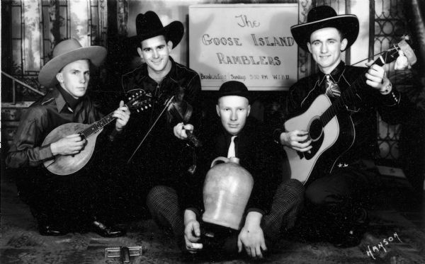 Original Goose Island Ramblers posing with their instruments.  (Left-right) "Stubby" Stuvatraa, Wendell "Wendy" Whitford, Alvin "Salty" Haugen and Vern Minor.