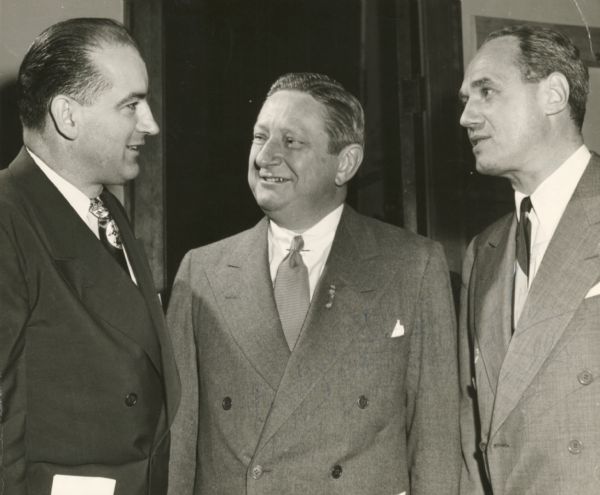 Journalist Robert Fleming with Wisconsin Republicans Joseph R. McCarthy and Walter J. Kohler, Jr.  Although only faintly seen, Senator McCarthy has autographed the picture.