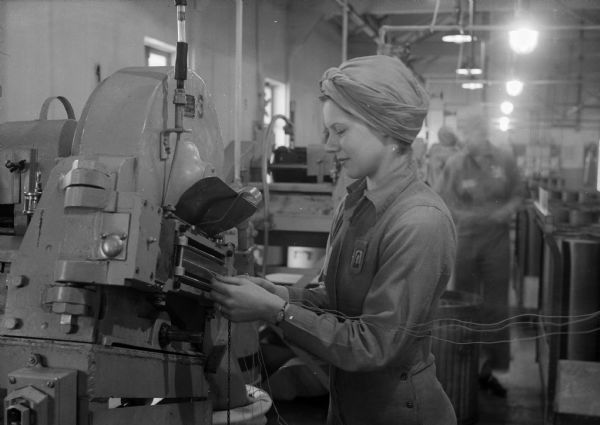 Woman working at the Badger Ammunition Plant.