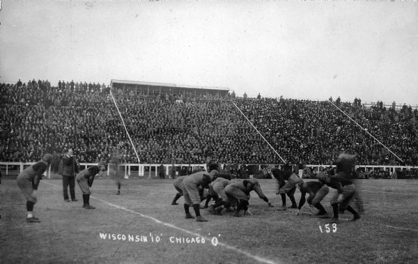 University of Wisconsin football game at Camp Randall Stadium. Score etched on photograph indicates that Wisconsin wins against Chicago 10 points to zero.