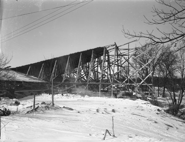 The prow of the Unitarian Meeting House during construction, with the roof trusses in place. The building was designed by Frank Lloyd Wright and constructed by Marshall Erdman with some assistance from members of the Meeting House congregation.