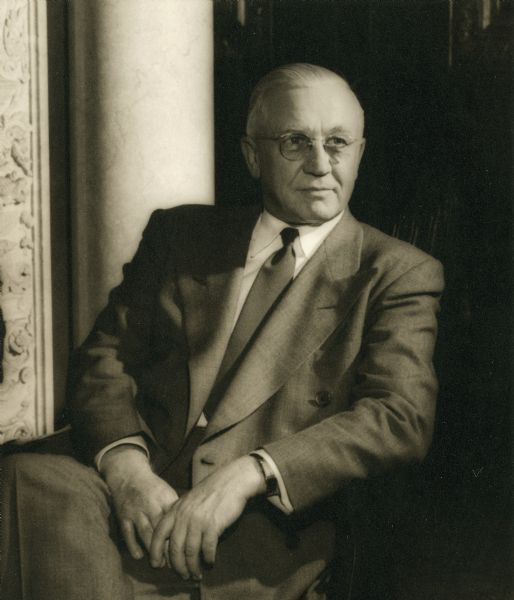 Seated portrait of Governor Oscar Rennebohm.