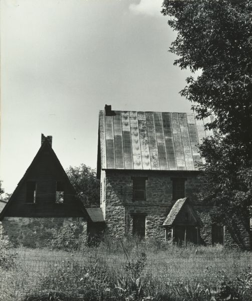 Dr. William H. Brisbane house, also known as the Thudium house. It was built between 1868 and 1869 from locally quarried stone for Dr. Brisbane, a physician and Baptist minister. He resided there until 1877.