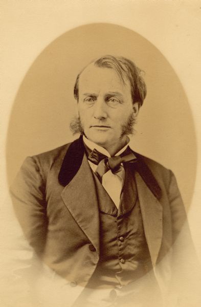 Waist-up portrait of Lucius Fairchild.